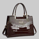 Erain - Γυαλιστερή τσάντα από δέρμα κροκόδειλου