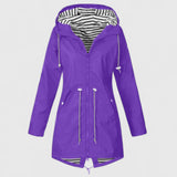 Φωτεινή - Κομψό αδιάβροχο γυναικείο μπουφάν με διακριτική λάμψη